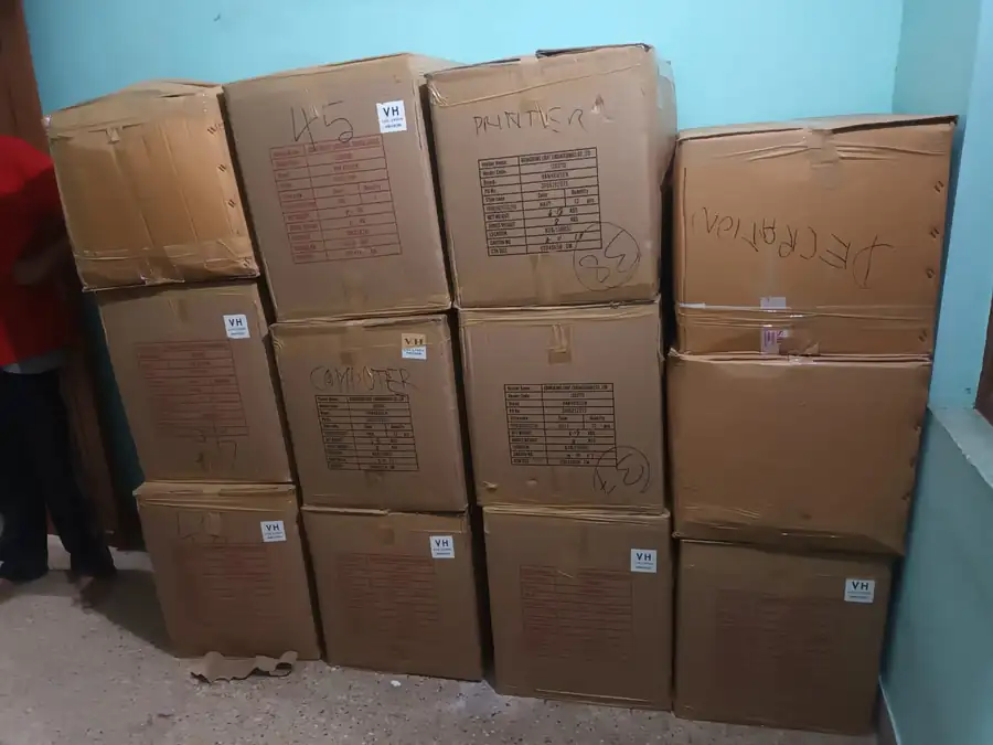 Office cartons labelled COMPUTER and PRINTER for an office relocation